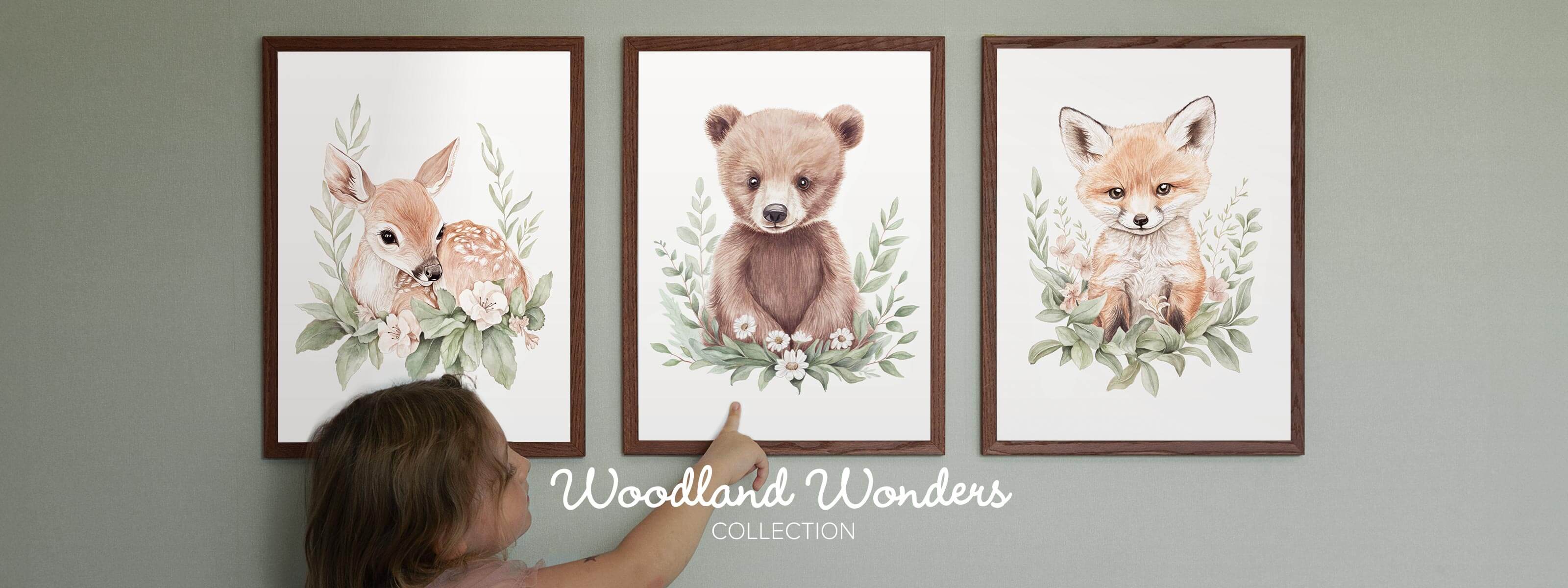 Child pointing at the Benji bear watercolor nursery print